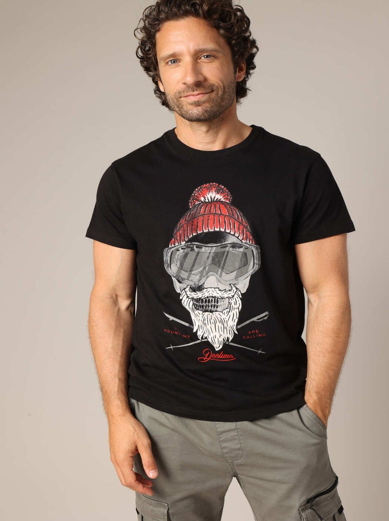 T-shirt en 100% coton avec illustration originale d’un skieur barbu au style vintage. 'Deeluxe' Noir - Kiabi