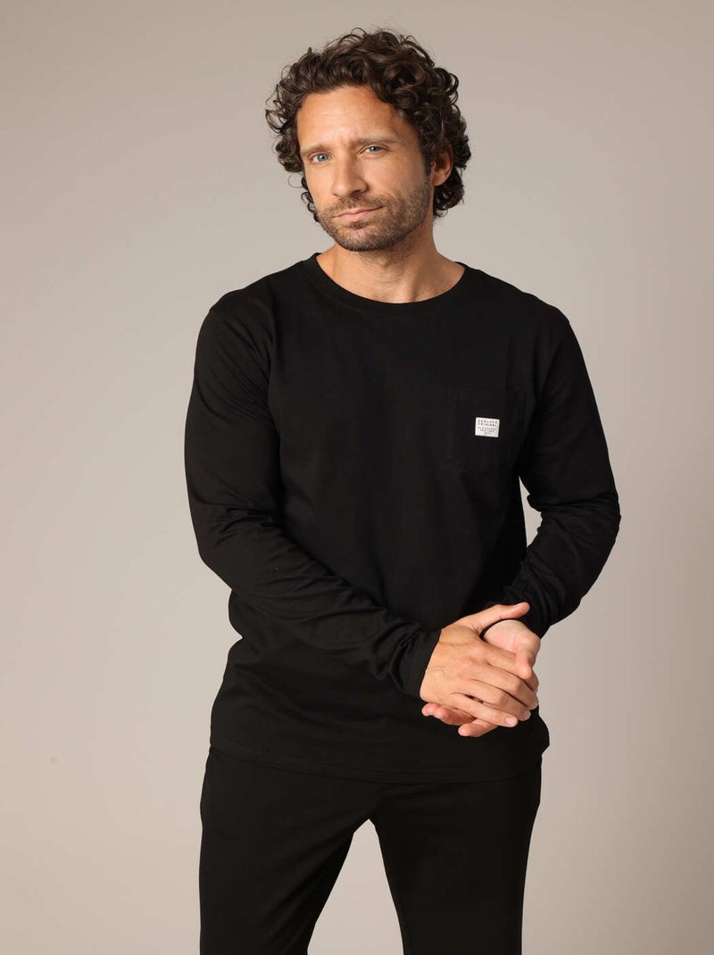 T-shirt en 100% coton BCI avec poche plaquée sur la poitrine et étiquette brodée. 'Deeluxe' Noir - Kiabi