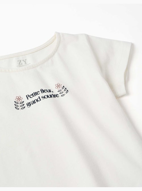 T-shirt en coton avec imprimé et ourlet à volants - Kiabi T-shirt en coton avec imprimé et ourlet à volants - Kiabi