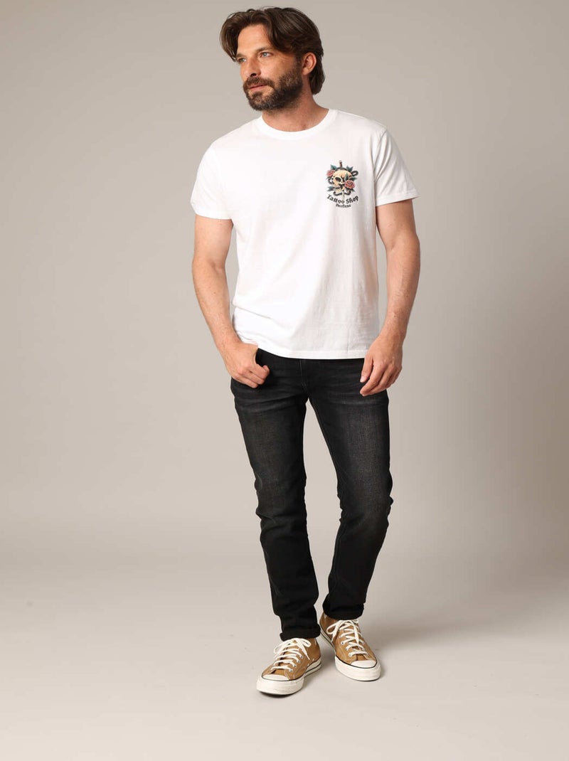 T-shirt en coton avec imprimé « Tattoo Shop » au dos et motif tête de mort sur le devant
 'Deeluxe' Ecru - Kiabi