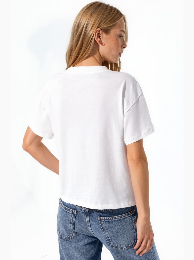 T-shirt en coton imprimé à col ras du cou et coupe classique hiccup Blanc - Kiabi