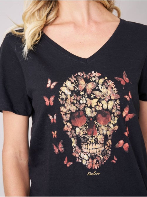 T-shirt femme en 100% coton avec imprimé tête de mort florale 'Deeluxe' - Kiabi T-shirt femme en 100% coton avec imprimé tête de mort florale 'Deeluxe' - Kiabi