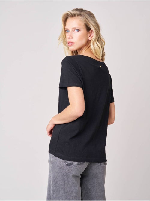 T-shirt femme en 100% coton avec imprimé tête de mort florale 'Deeluxe' - Kiabi T-shirt femme en 100% coton avec imprimé tête de mort florale 'Deeluxe' - Kiabi