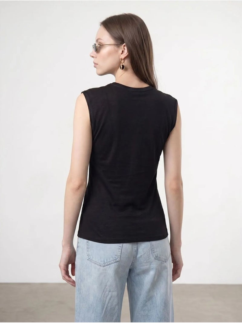 T-shirt femme en coton sans manches à col rond et lien Noir - Kiabi