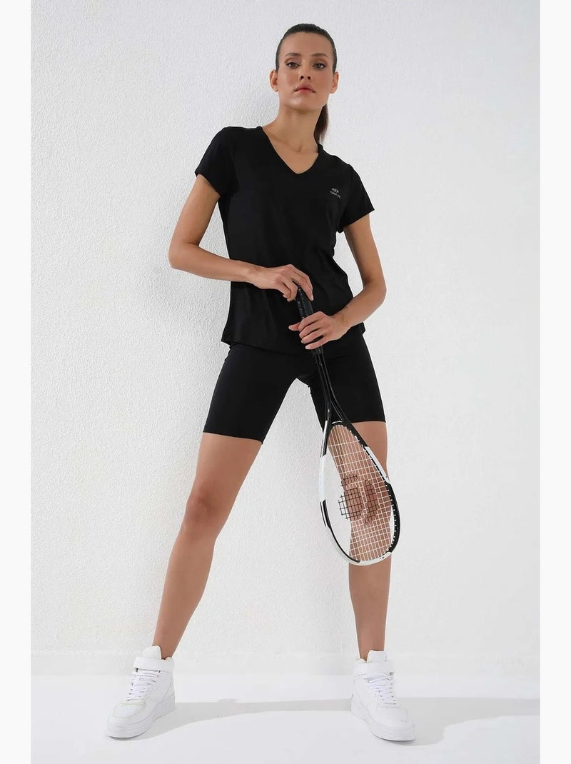 T-shirt femme uni à col v et manches courtes tommy Noir - Kiabi