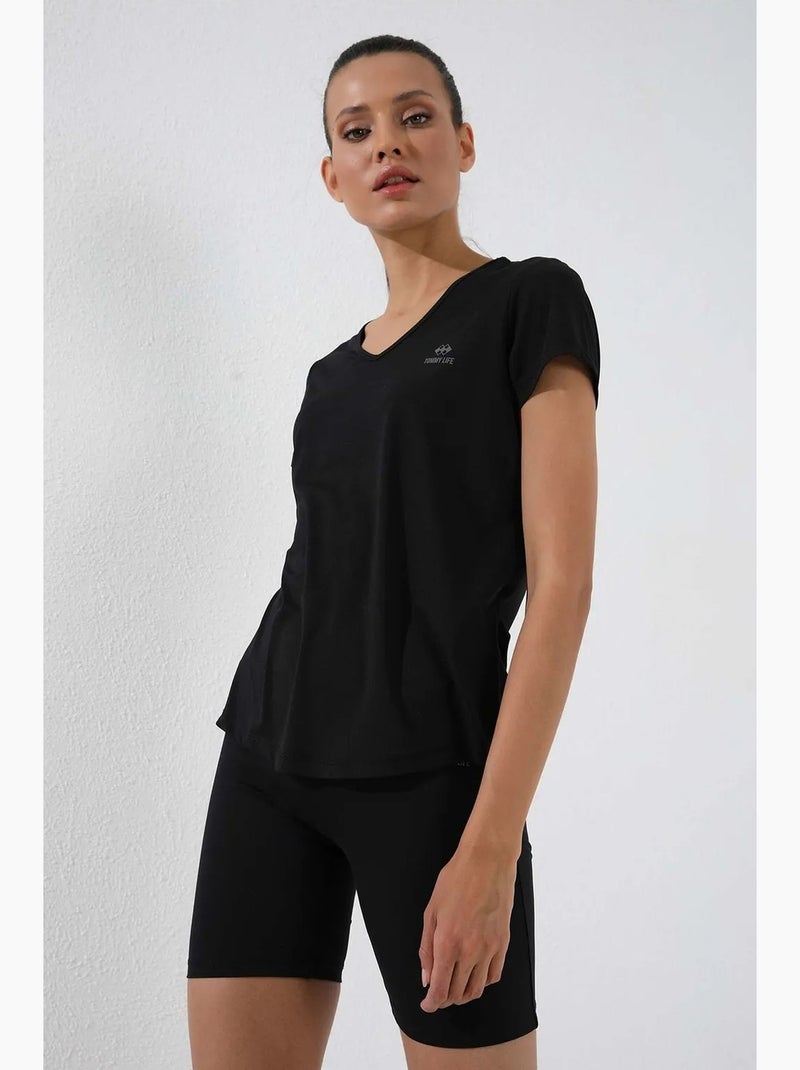 T-shirt femme uni à col v et manches courtes tommy Noir - Kiabi