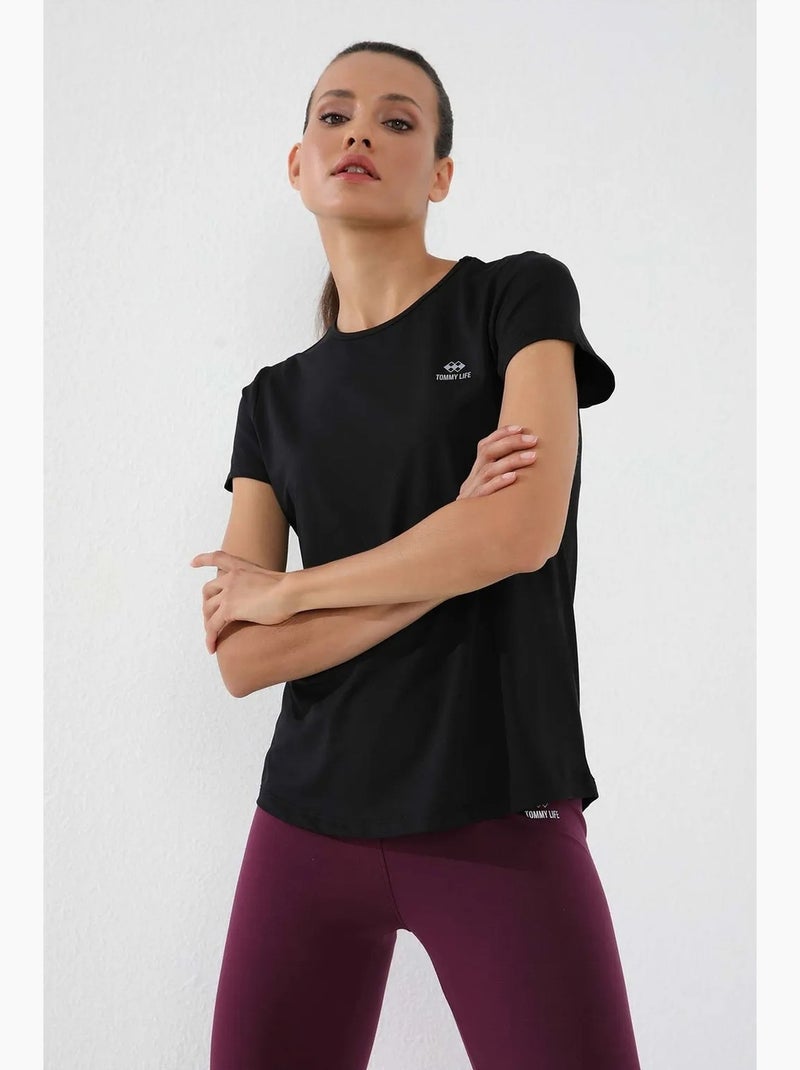 T-shirt femme uni à manches courtes et col rond tommy Noir - Kiabi