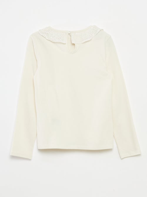 T-shirt grand col volanté avec sequins uni - Kiabi