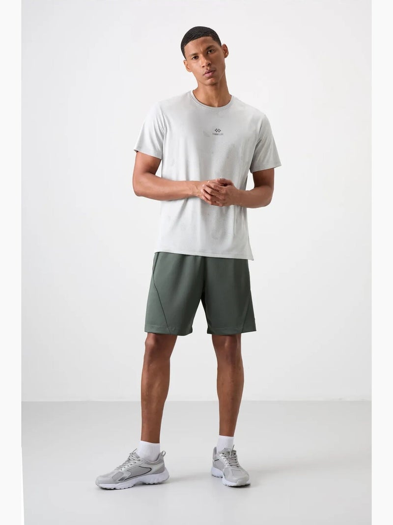 T-shirt homme uni à col rond, texture birdseye tommy Blanc cassé - Kiabi