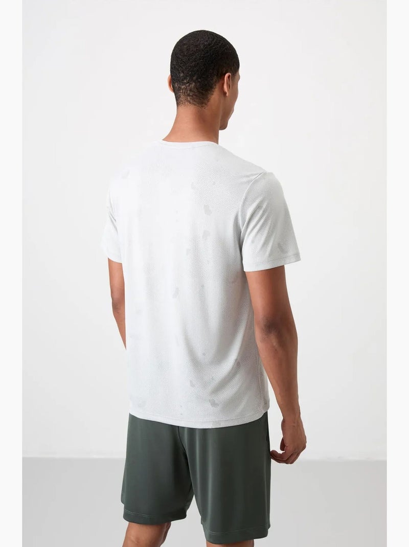 T-shirt homme uni à col rond, texture birdseye tommy Blanc cassé - Kiabi