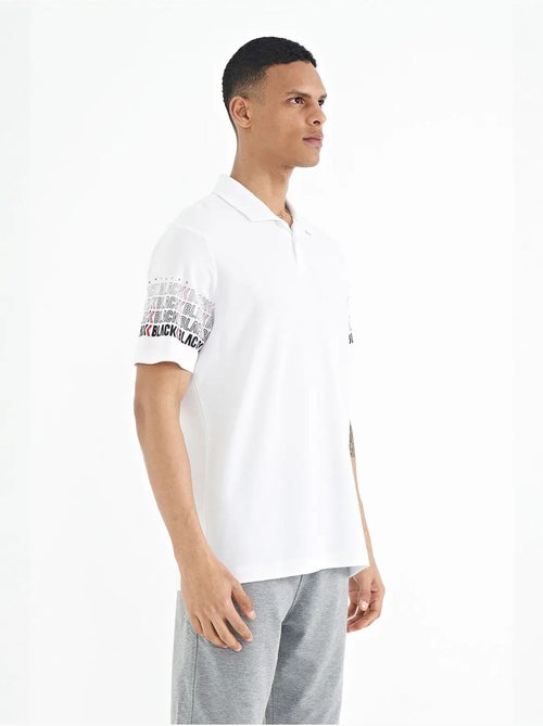 T-shirt imprimé à col polo tommy - Kiabi T-shirt imprimé à col polo tommy - Kiabi