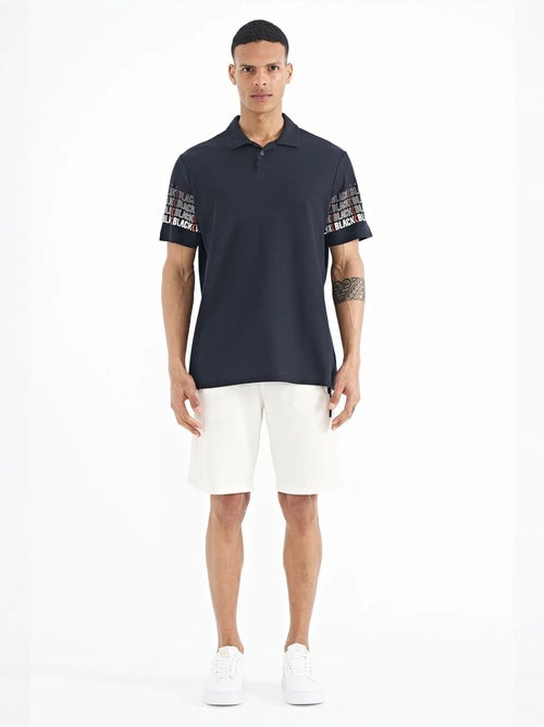 T-shirt imprimé à col polo tommy - Kiabi T-shirt imprimé à col polo tommy - Kiabi