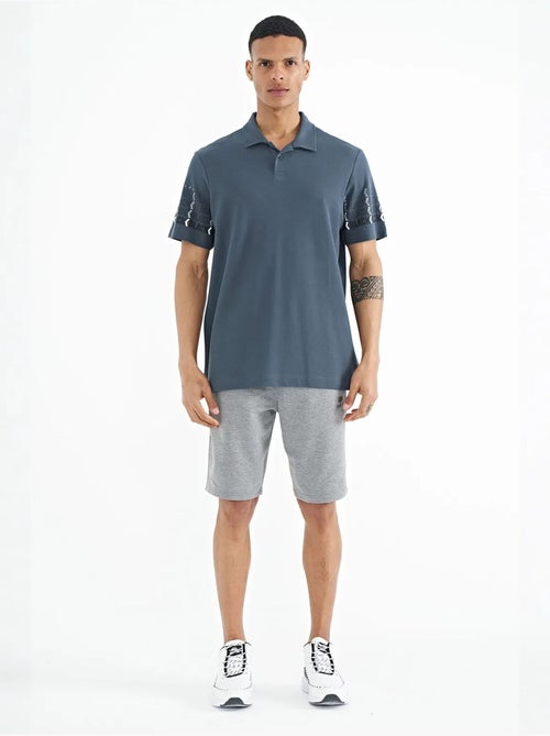 T-shirt imprimé à col polo tommy - Kiabi T-shirt imprimé à col polo tommy - Kiabi