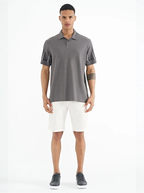 T-shirt imprimé à col polo tommy - Kiabi T-shirt imprimé à col polo tommy - Kiabi