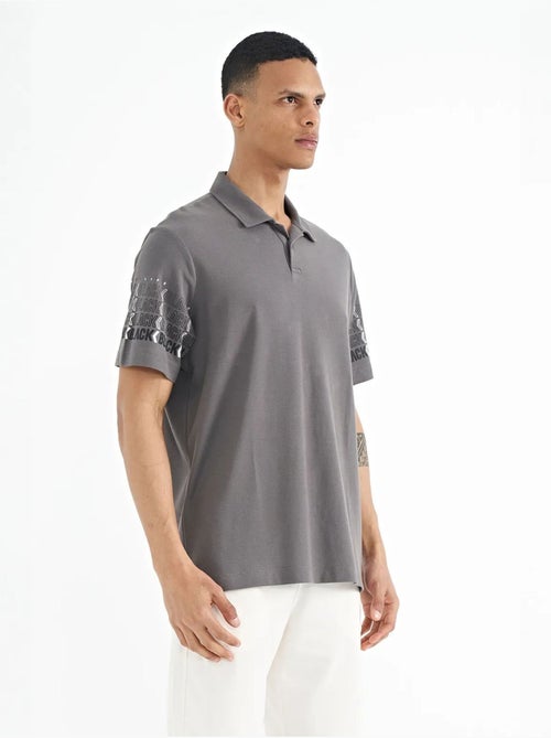 T-shirt imprimé à col polo tommy - Kiabi T-shirt imprimé à col polo tommy - Kiabi