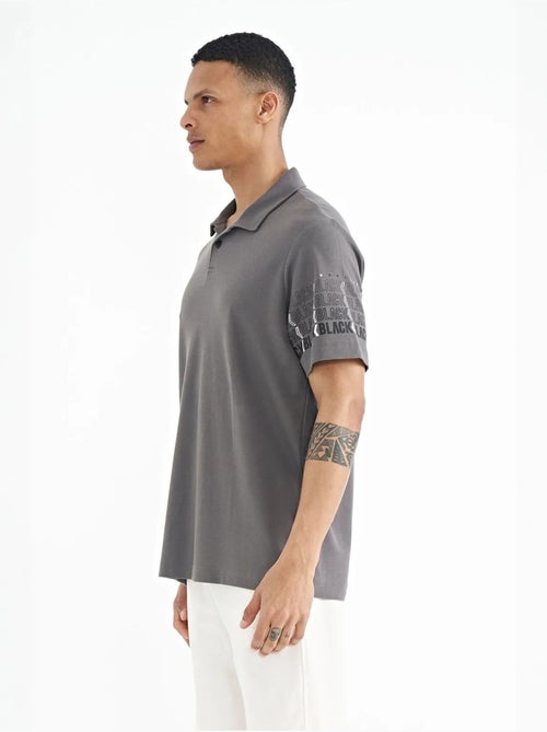 T-shirt imprimé à col polo tommy - Kiabi T-shirt imprimé à col polo tommy - Kiabi
