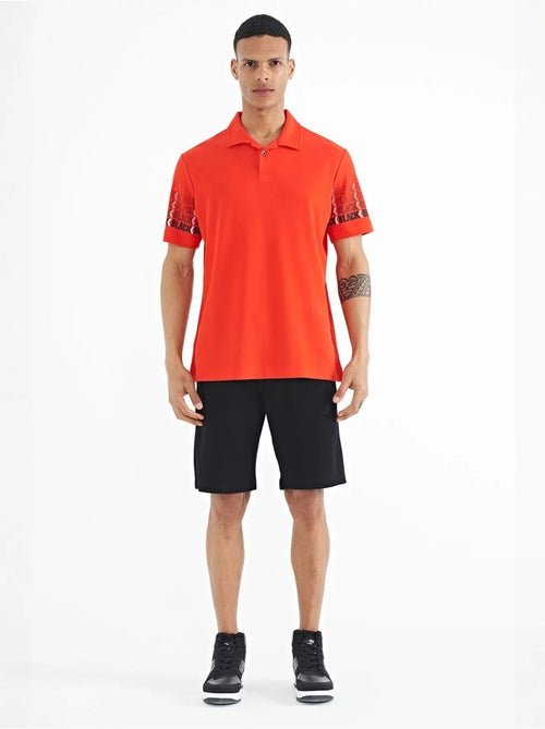 T-shirt imprimé à col polo tommy - Kiabi T-shirt imprimé à col polo tommy - Kiabi