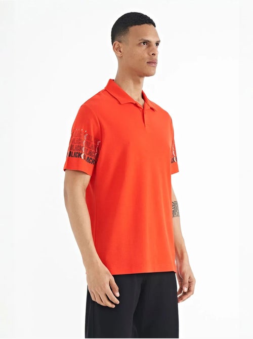 T-shirt imprimé à col polo tommy - Kiabi T-shirt imprimé à col polo tommy - Kiabi