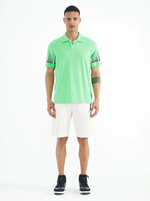 T-shirt imprimé à col polo tommy - Kiabi T-shirt imprimé à col polo tommy - Kiabi