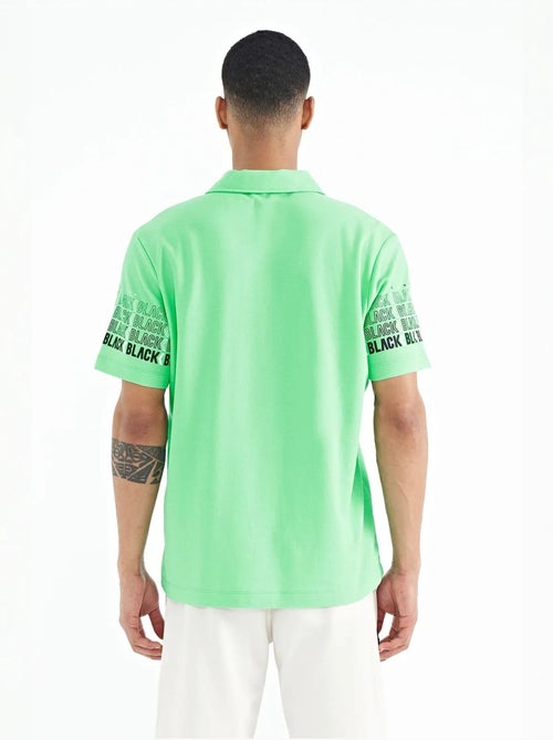 T-shirt imprimé à col polo tommy - Kiabi T-shirt imprimé à col polo tommy - Kiabi