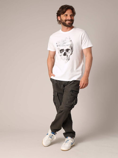 T-shirt imprimé tête de mort couronnée avec inscription « The Original 1974 Style » 'Deeluxe' - Kiabi T-shirt imprimé tête de mort couronnée avec inscription « The Original 1974 Style » 'Deeluxe' - Kiabi