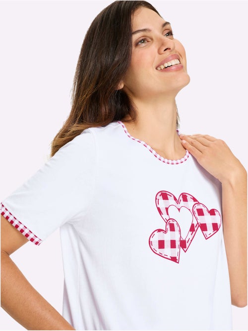 T-shirt long à col rond et manches courtes avec motif cœurs - Taille standard - Moda Vilona - Kiabi T-shirt long à col rond et manches courtes avec motif cœurs - Taille standard - Moda Vilona - Kiabi