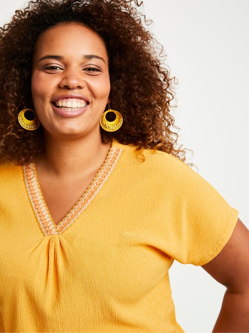 T-shirt long ample uni brodé - Kiabi