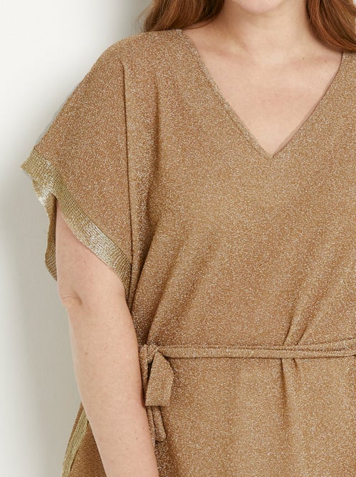 T-shirt long brillant doré manches chauve-souris - Kiabi