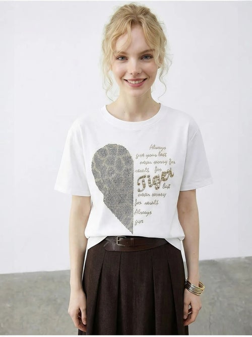 T-shirt lucci à col rond et imprimé texte à sequins - Kiabi T-shirt lucci à col rond et imprimé texte à sequins - Kiabi