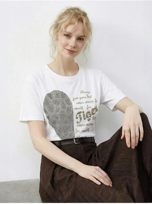 T-shirt lucci à col rond et imprimé texte à sequins - Kiabi T-shirt lucci à col rond et imprimé texte à sequins - Kiabi