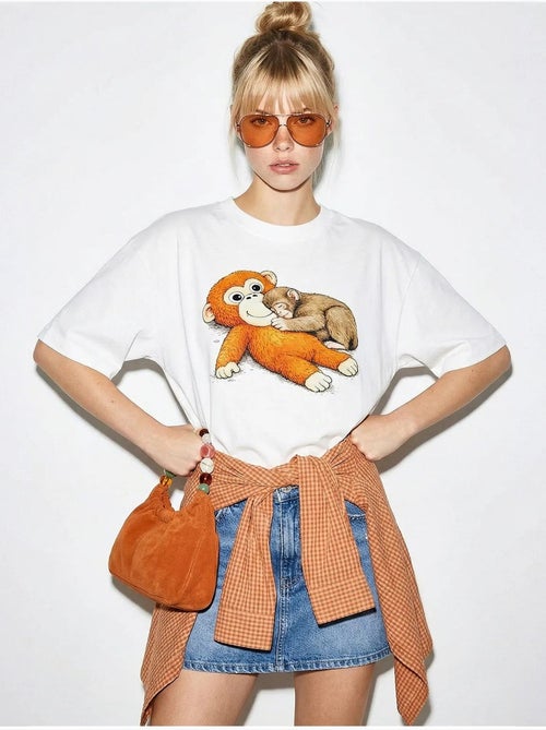 T-shirt lucci imprimé à col rond avec détail accessoire - Kiabi T-shirt lucci imprimé à col rond avec détail accessoire - Kiabi