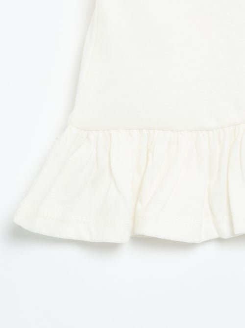 T-shirt manches courtes avec broderies et base volantée - Kiabi T-shirt manches courtes avec broderies et base volantée - Kiabi