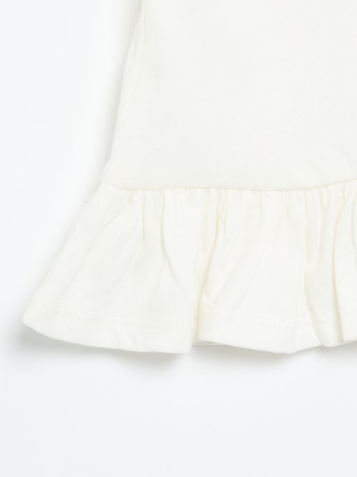 T-shirt manches courtes avec broderies et base volantée - Kiabi T-shirt manches courtes avec broderies et base volantée - Kiabi