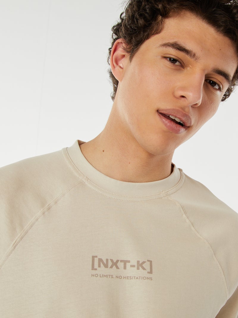 T-shirt manches courtes raglan imprimé Beige - Kiabi