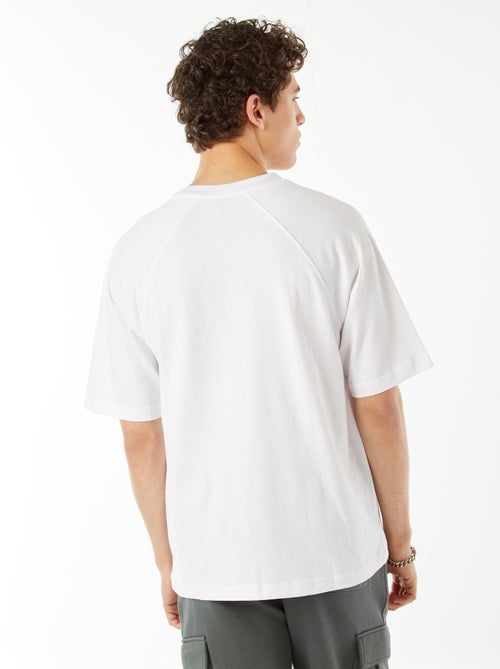 T-shirt manches courtes raglan imprimé - Kiabi T-shirt manches courtes raglan imprimé - Kiabi