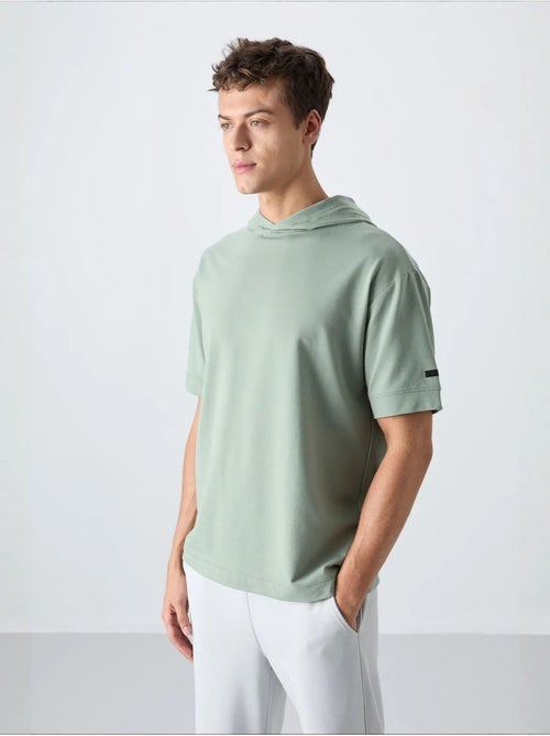 T-shirt oversize à capuche et manches courtes tommy - Kiabi T-shirt oversize à capuche et manches courtes tommy - Kiabi