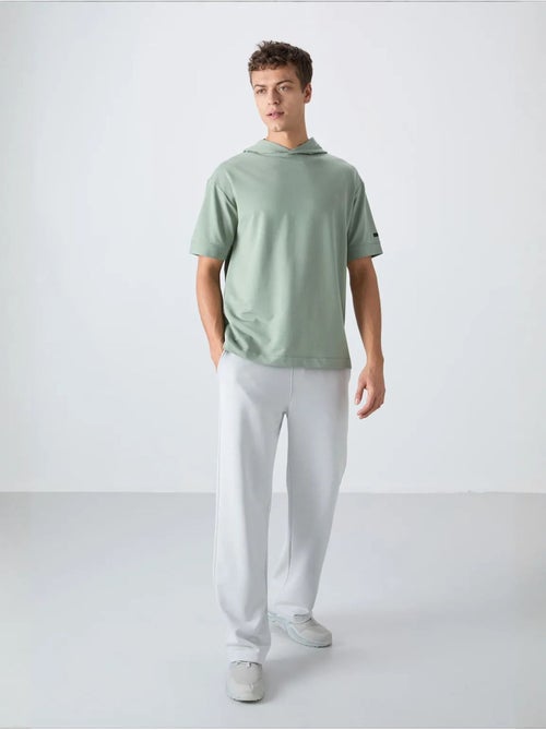 T-shirt oversize à capuche et manches courtes tommy - Kiabi T-shirt oversize à capuche et manches courtes tommy - Kiabi