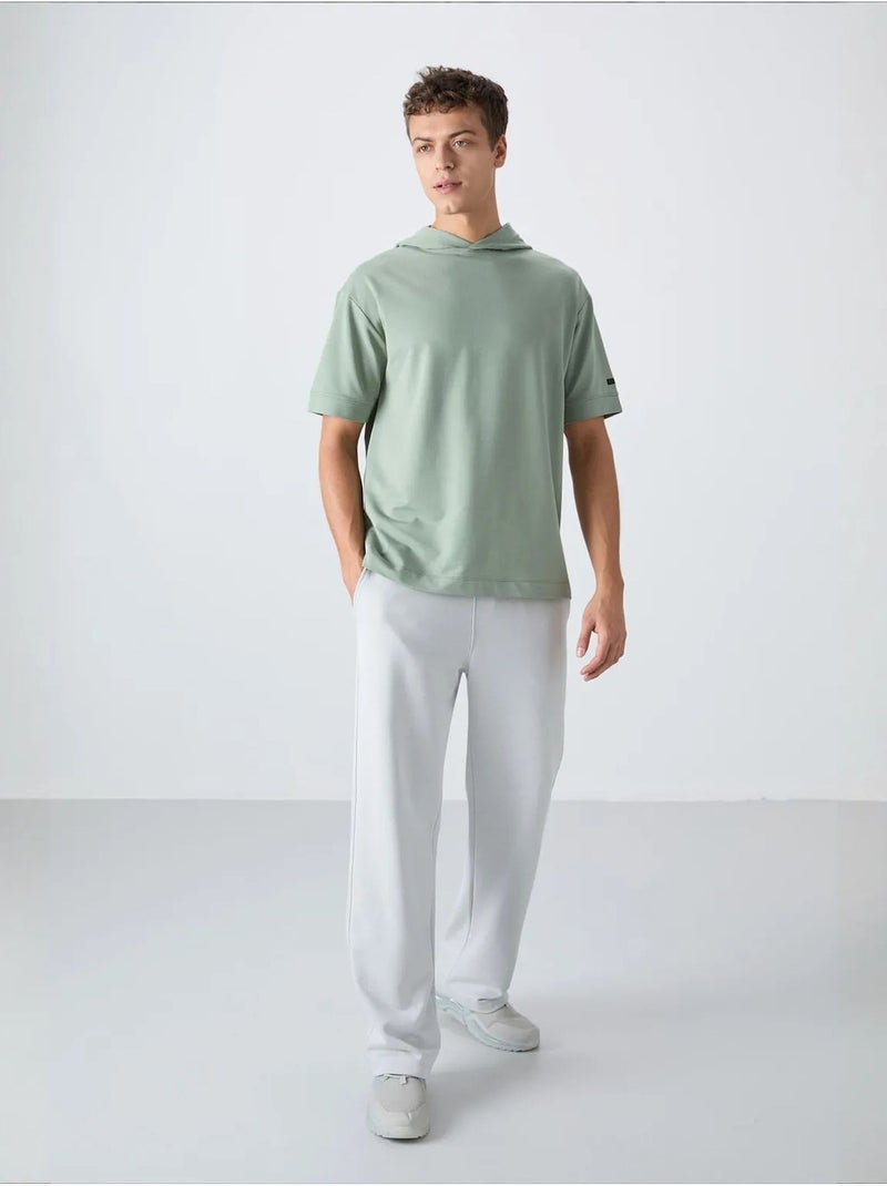 T-shirt oversize à capuche et manches courtes tommy Vert menthe - Kiabi