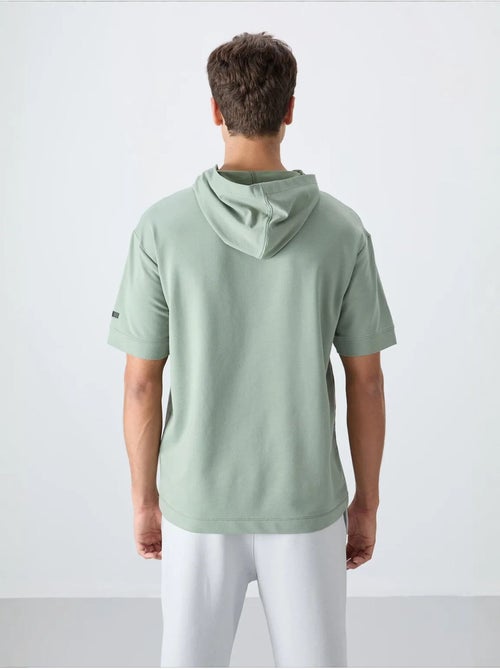 T-shirt oversize à capuche et manches courtes tommy - Kiabi T-shirt oversize à capuche et manches courtes tommy - Kiabi