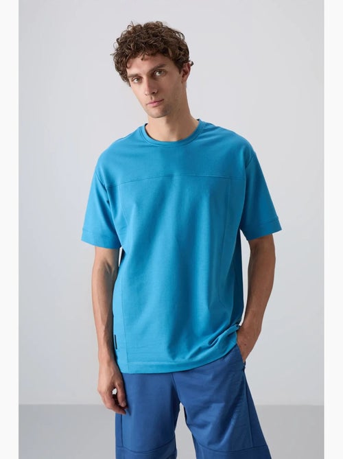 T-shirt oversize à col rond tommy - Kiabi T-shirt oversize à col rond tommy - Kiabi
