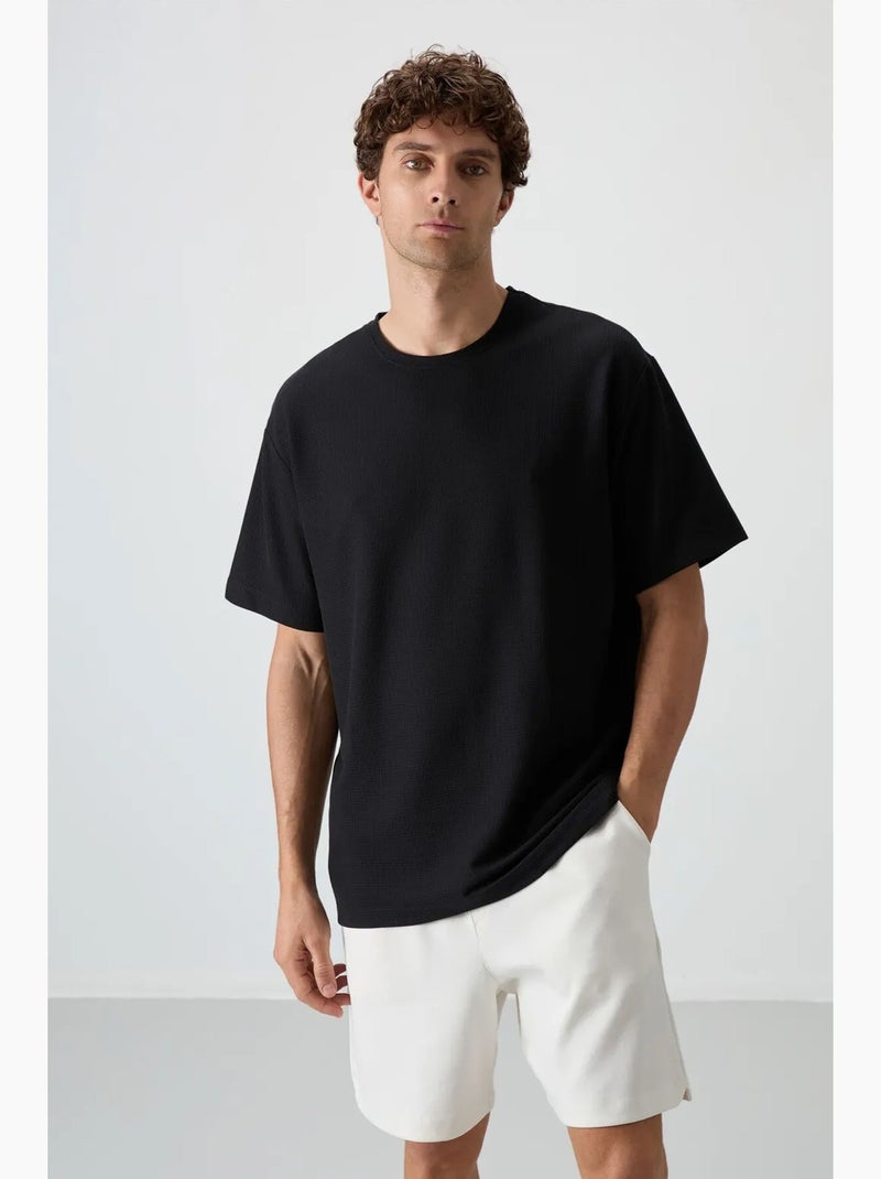 T-shirt oversize à col rond tommy Noir - Kiabi