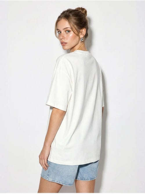 T-shirt oversize en coton avec étoile à sequins lucci - Kiabi T-shirt oversize en coton avec étoile à sequins lucci - Kiabi