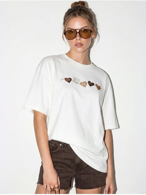 T-shirt oversize en coton avec imprimé cœur lucci - Kiabi T-shirt oversize en coton avec imprimé cœur lucci - Kiabi