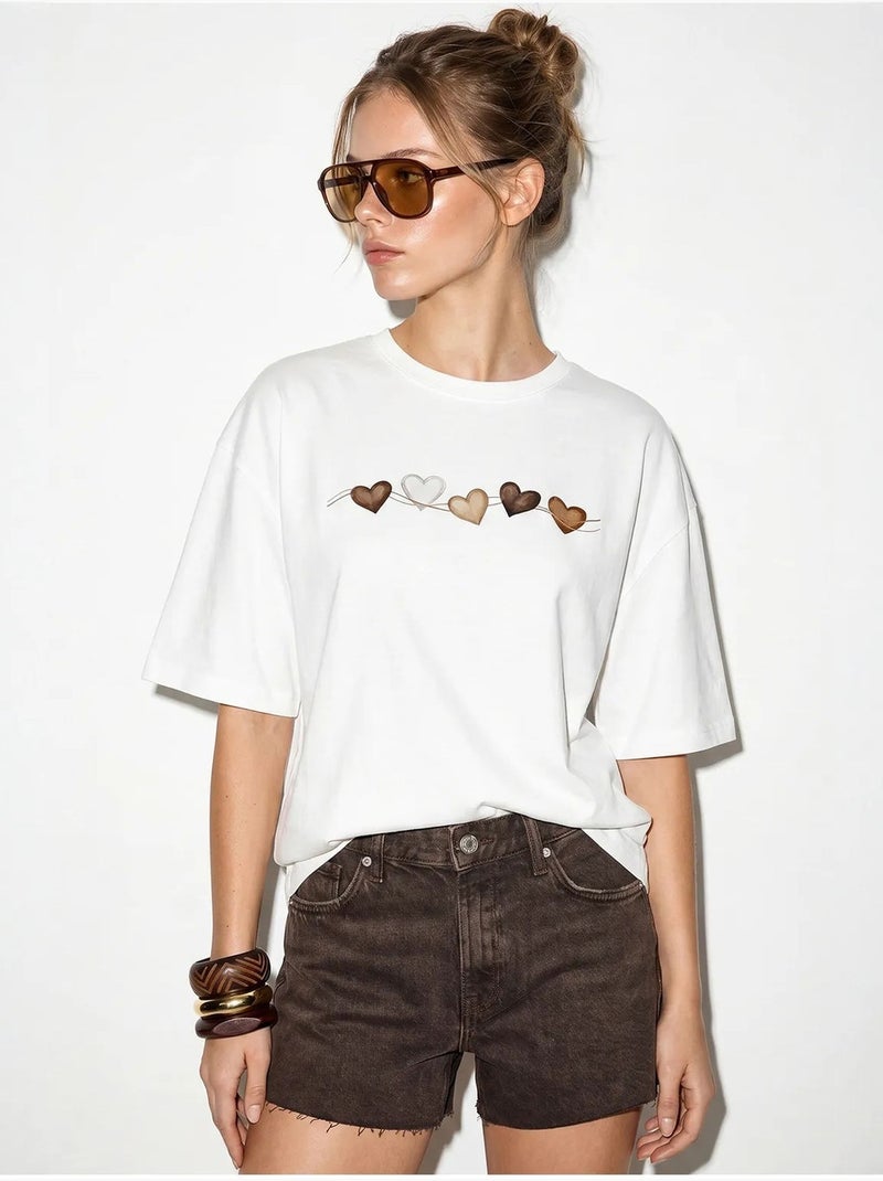 T-shirt oversize en coton avec imprimé cœur lucci Blanc - Kiabi