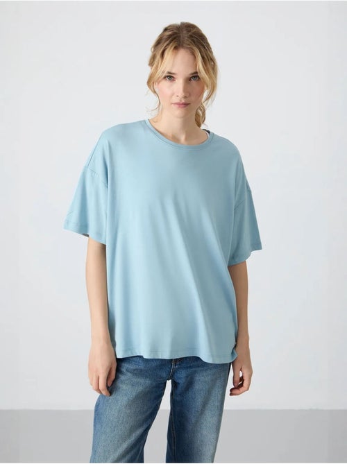T-shirt oversize en coton et modal à col rond tommy - Kiabi T-shirt oversize en coton et modal à col rond tommy - Kiabi