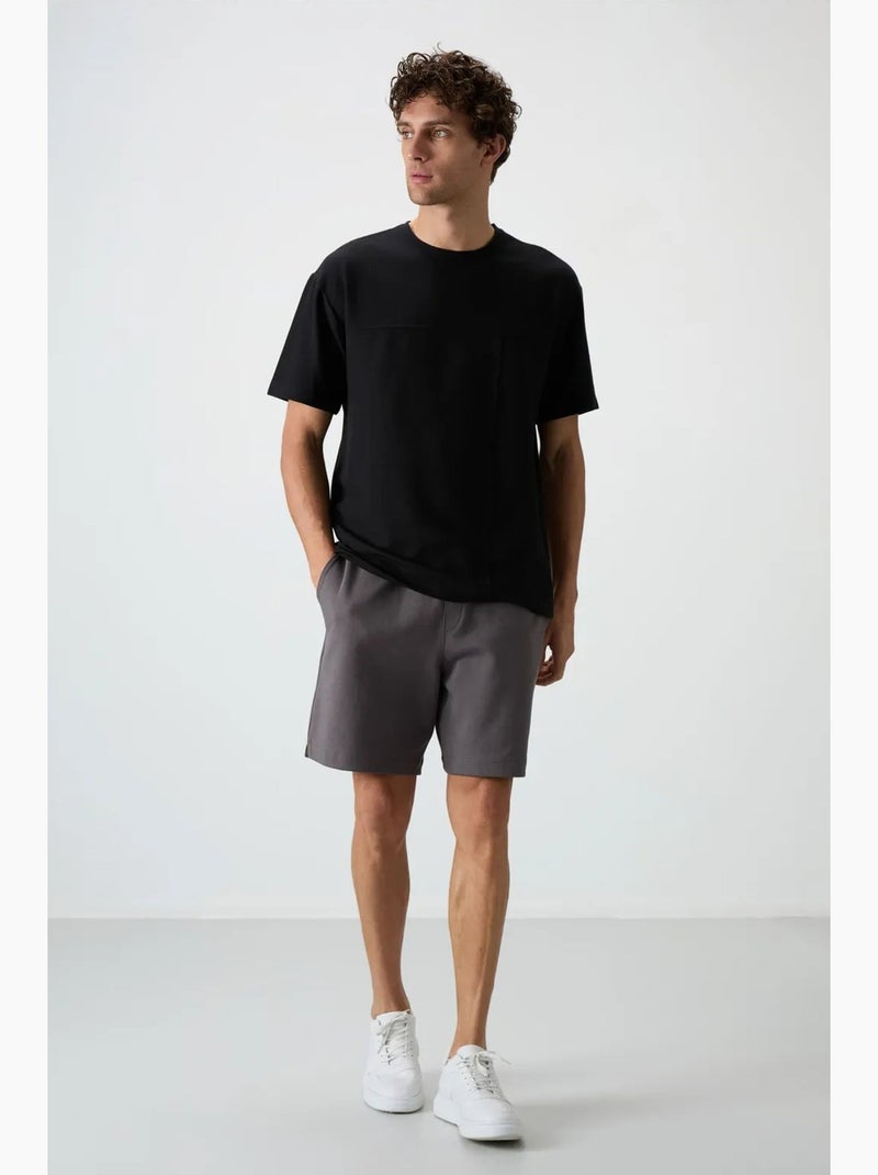 T-shirt oversize en jersey avec poche tommy Noir - Kiabi