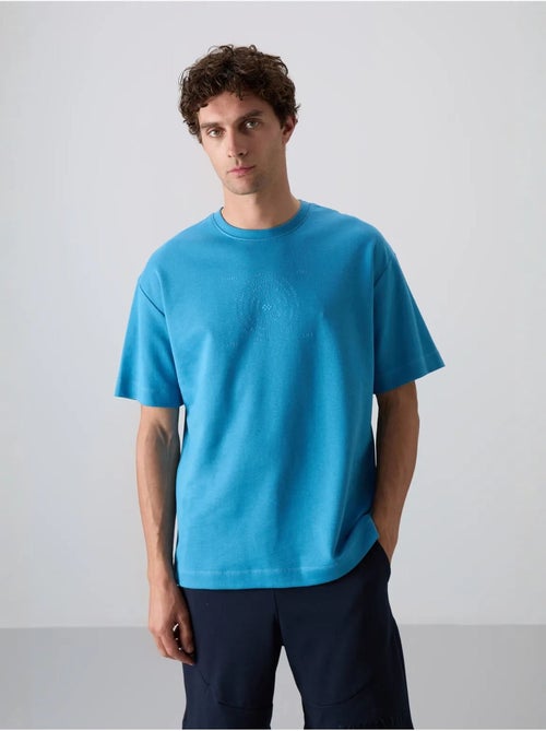 T-shirt oversize en mélange coton à col rond tommy - Kiabi T-shirt oversize en mélange coton à col rond tommy - Kiabi