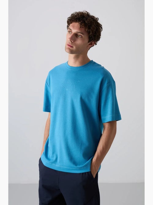 T-shirt oversize en mélange coton à col rond tommy - Kiabi T-shirt oversize en mélange coton à col rond tommy - Kiabi