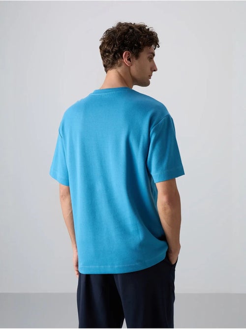 T-shirt oversize en mélange coton à col rond tommy - Kiabi T-shirt oversize en mélange coton à col rond tommy - Kiabi