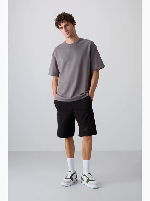 T-shirt oversize en mélange coton à col rond tommy - Kiabi T-shirt oversize en mélange coton à col rond tommy - Kiabi